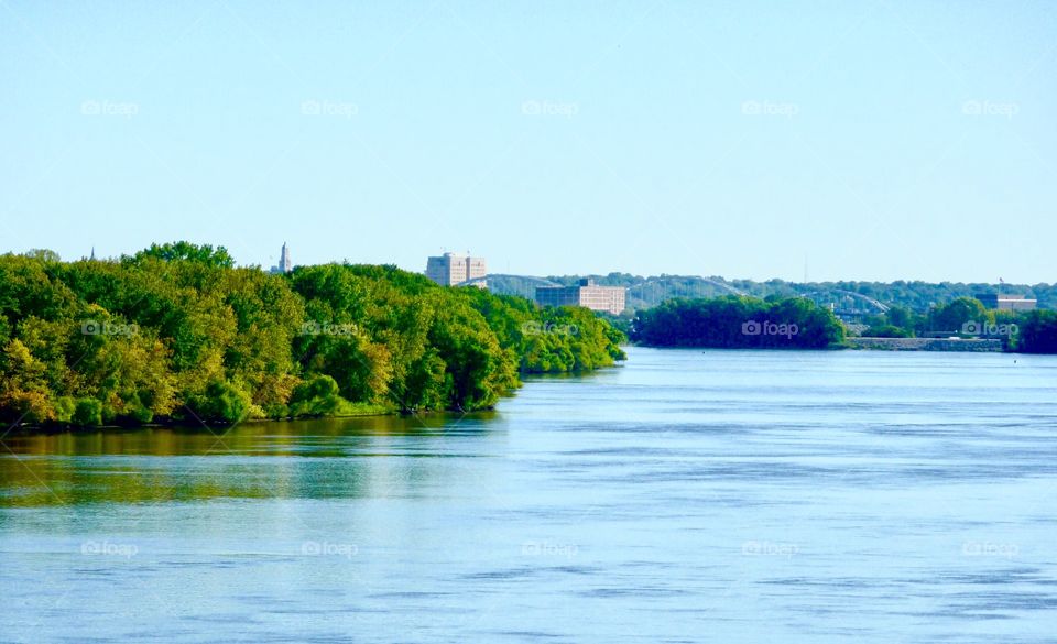 River Slowly Flows Through a City