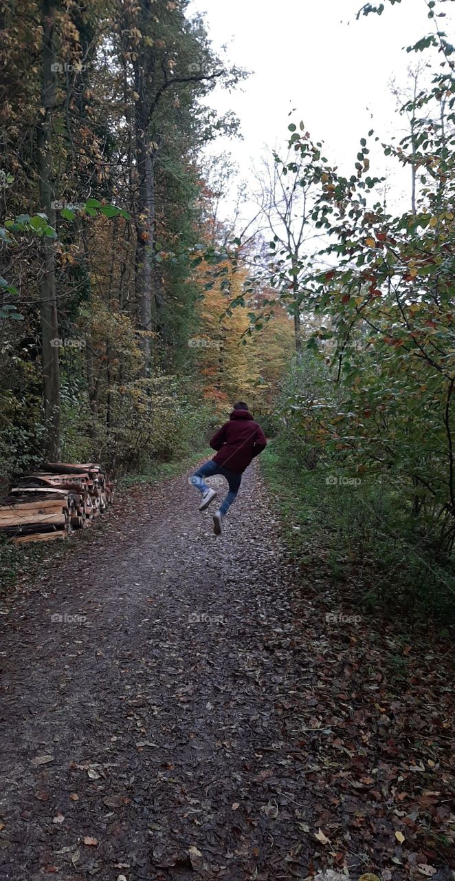jumping in the woods.