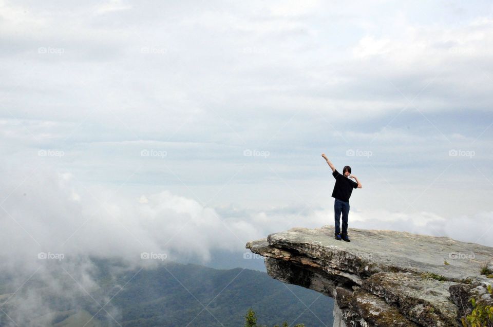 An unrecognizable person is seen on the summit of  McAfee  Knob, Virginia