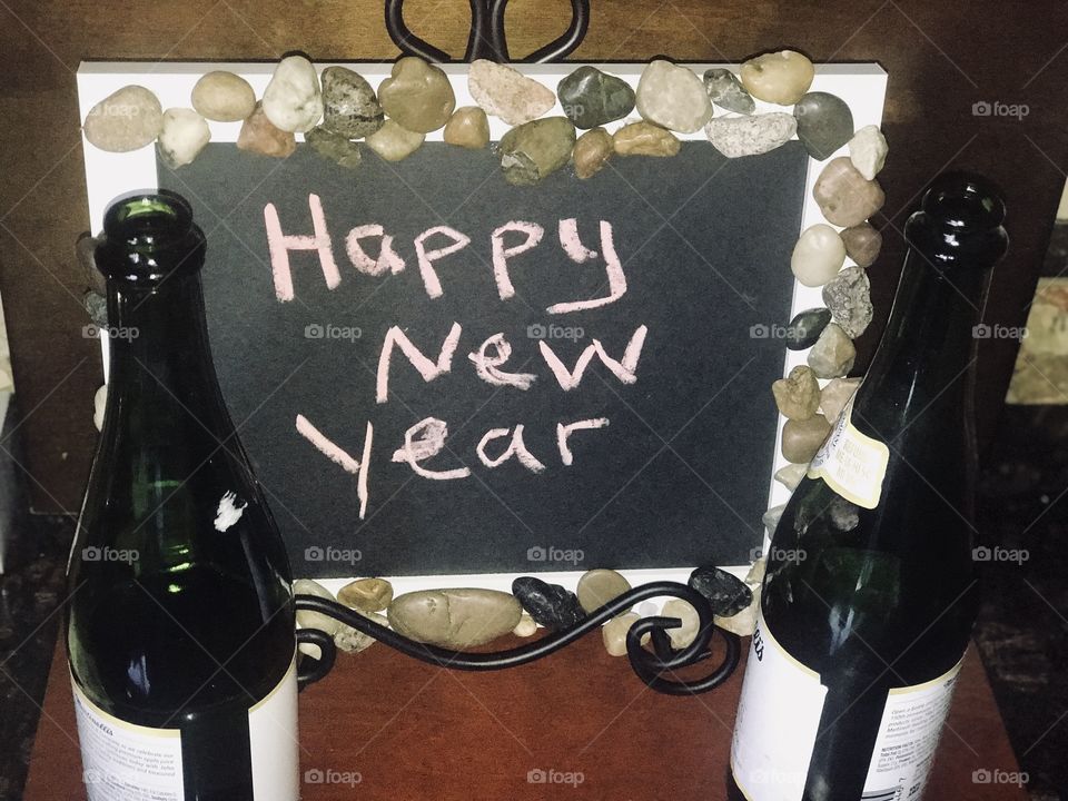 Happy New Year’s Eve celebrating with a delicious beverage of apple cider non alcoholic beverages 