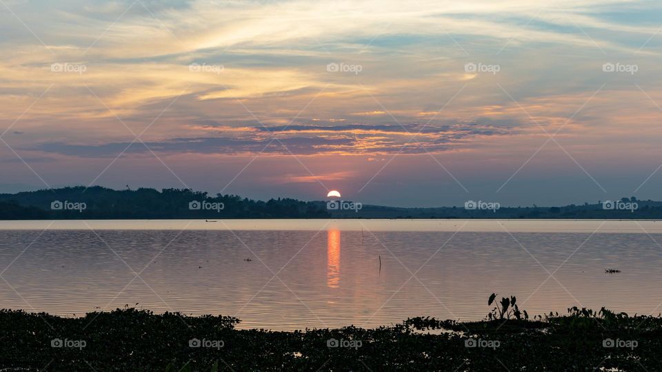 Sunset by the Chiang Saan lake Chiangrai Thailand