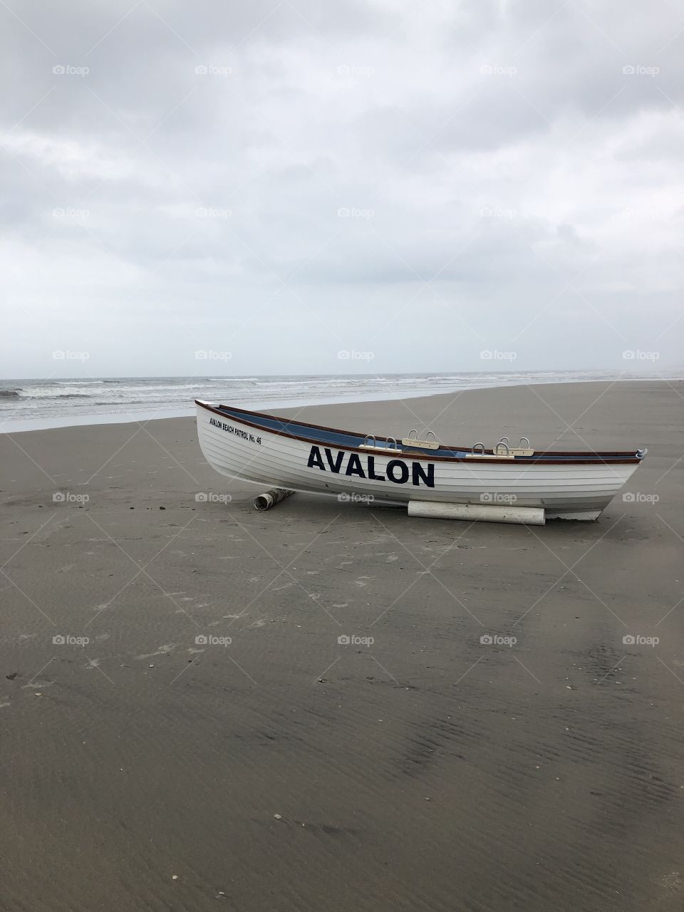 A lifeboat sits on a deserted beach in Avalon, New Jersey.
