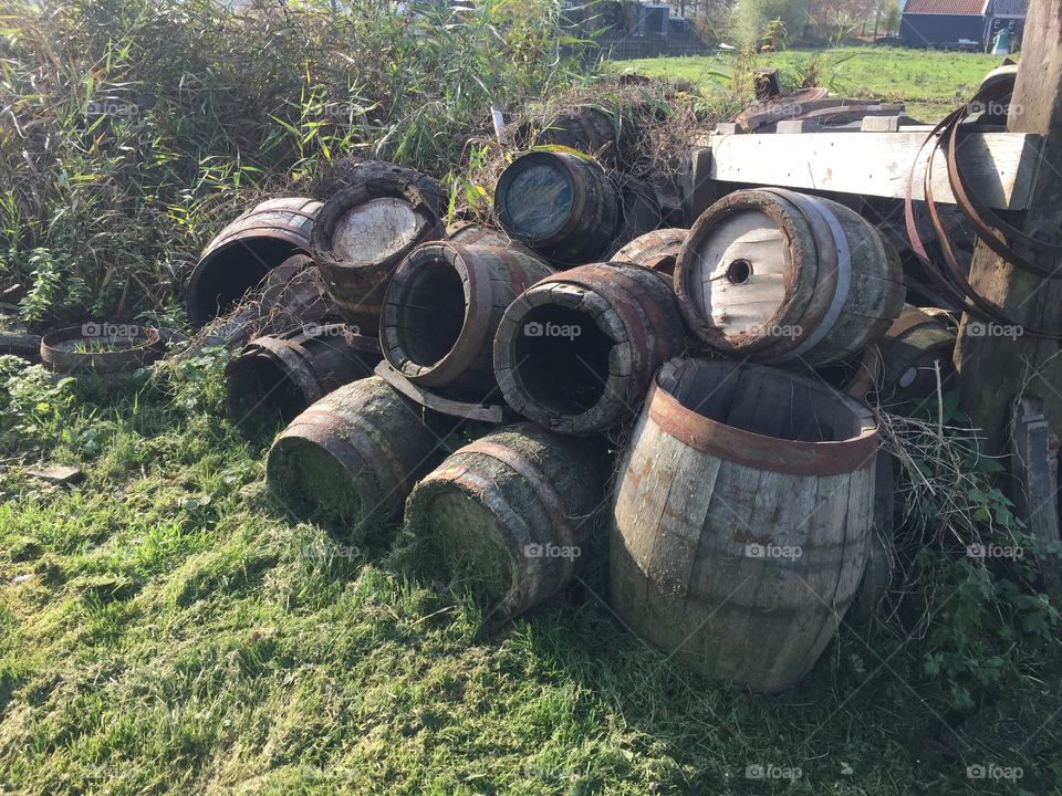 Old Barrels. A pile of old barrels outside a barrelfactory