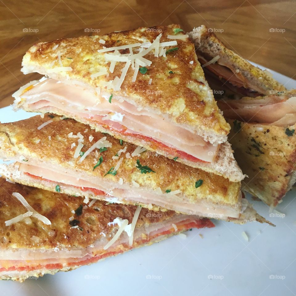 You guessed it! A Monte Cristo topped with parsley and Parmesan! Simple yet mouthwatering.