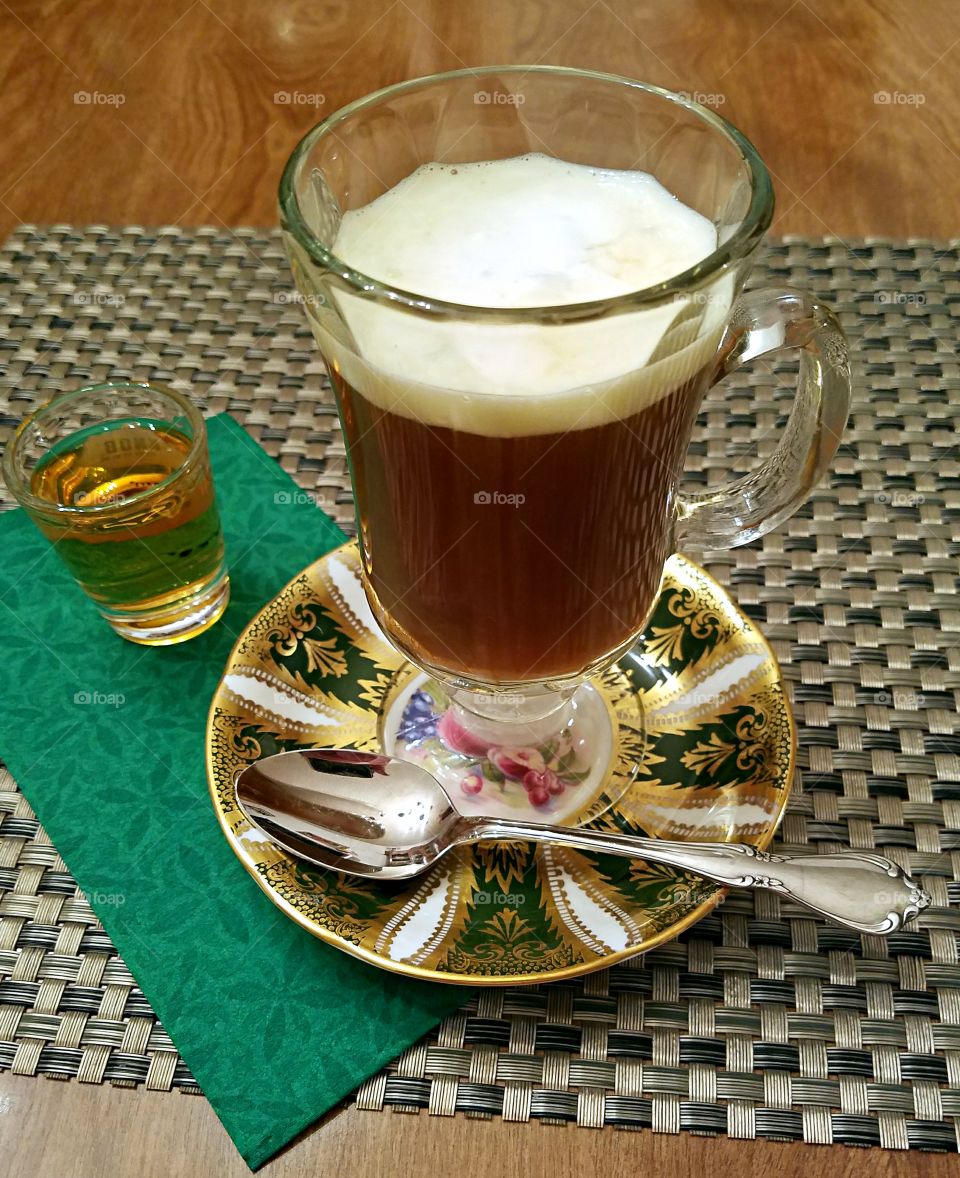 Let me have a coffee, and make it an Irish Coffee please!