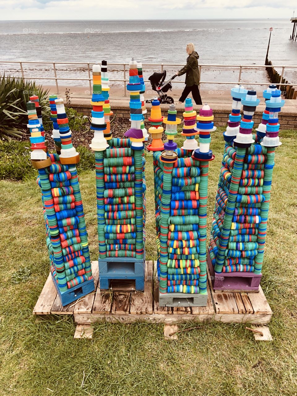 These displays which were catching a lot of attention in Teignmouth yesterday, were all made out of bottle tops, it makes for a very colourful and rather fun finish.