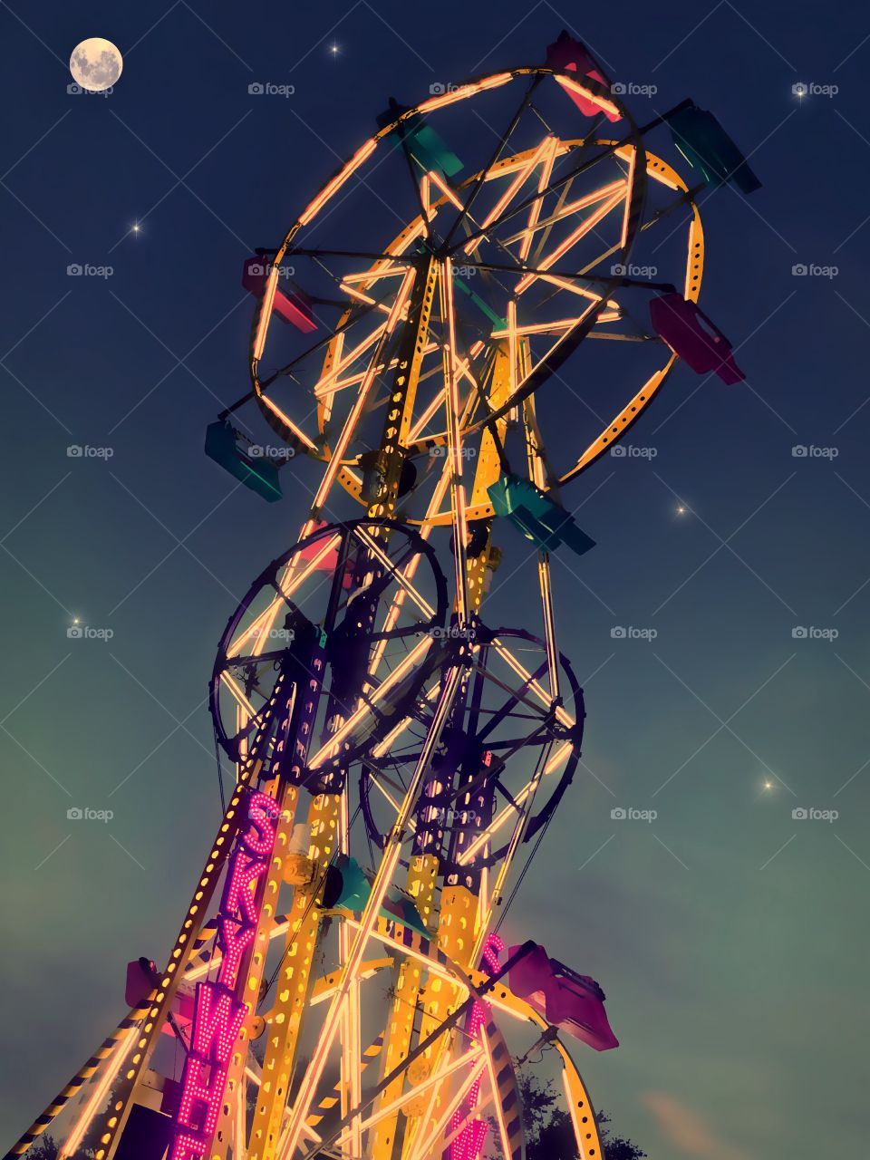 Ferris wheel on a starry night at the fair.