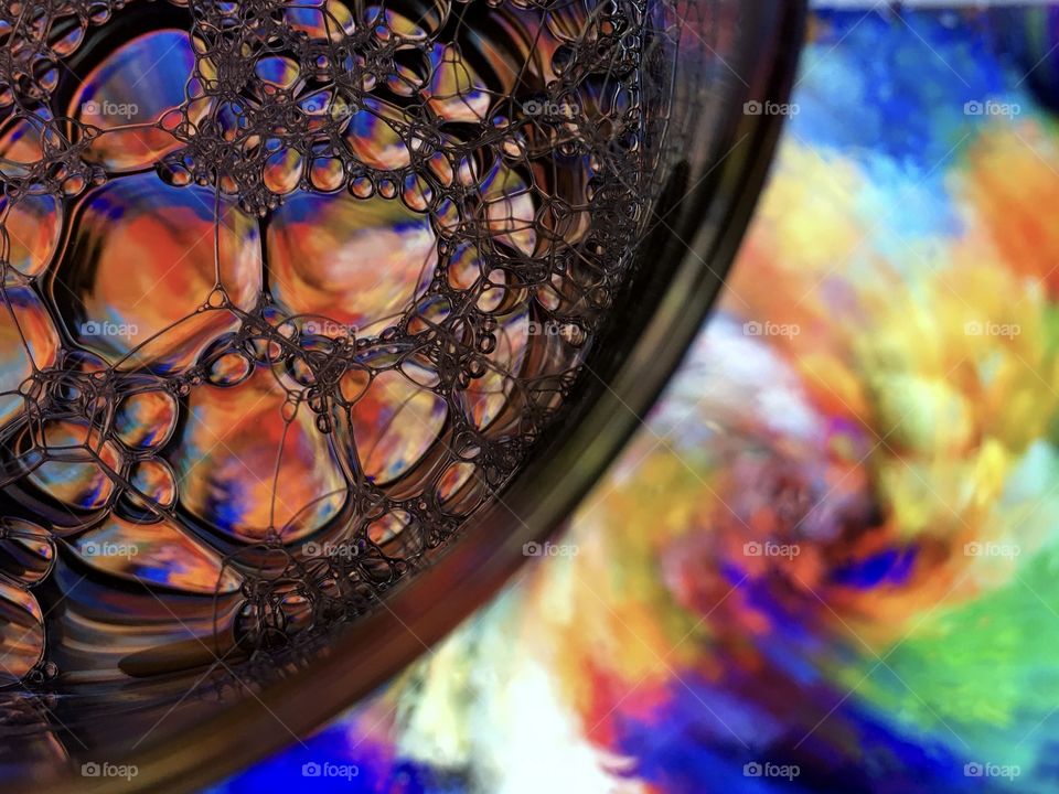 I don't know how to describe this photo. 
I'll just write "water", "oil", "bubbles".