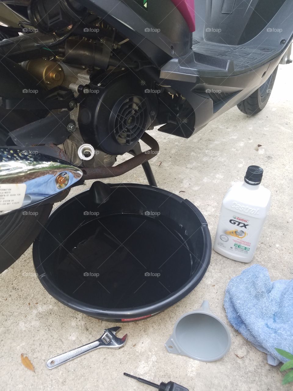 oil change on a moped scootrr