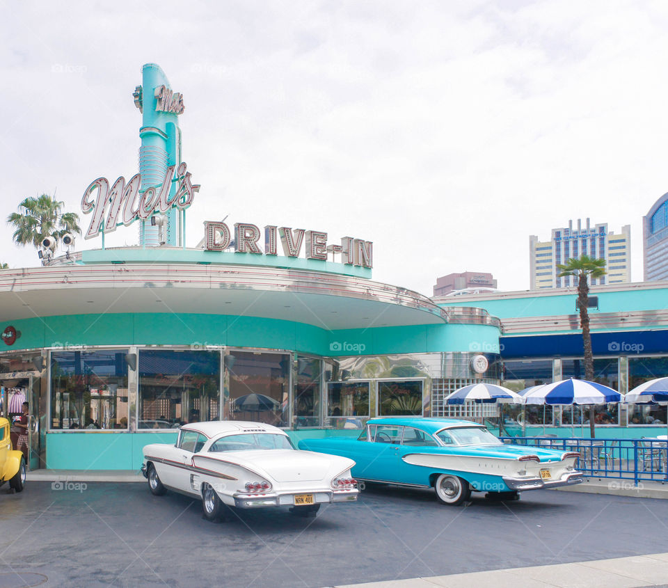 Osaka, Japan - June2, 2015 : A photo of Mel's Drive in cafe and restaurant with vintage cars parking located in front at at Universal Studios Japan, a theme park in Osaka. Editorial use only.