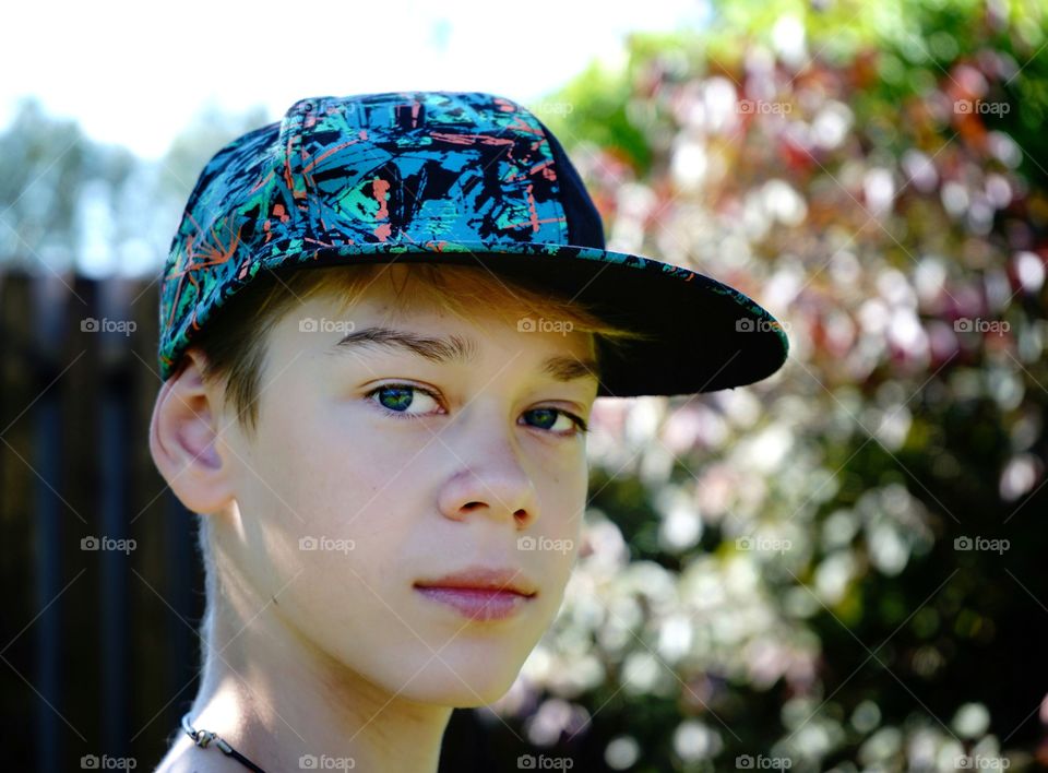 face human Light portrait people outdoors sky boy smiling one person young adult people cap