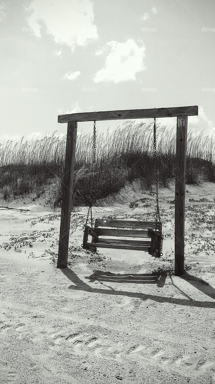 relax. this swing is in Tybee beach in Savannah.