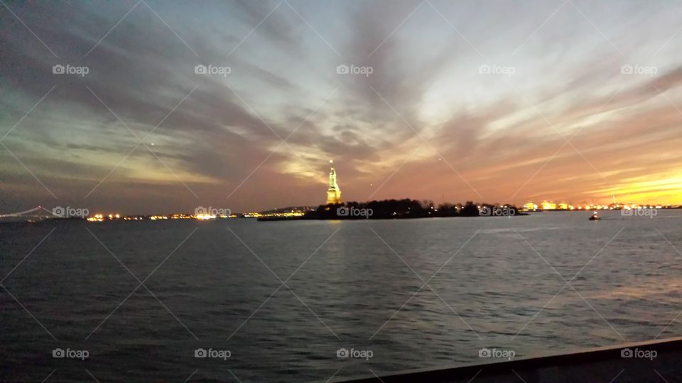 Statue of Liberty at Dusk. Picture of the Statue of Liberty at dusk from a boat