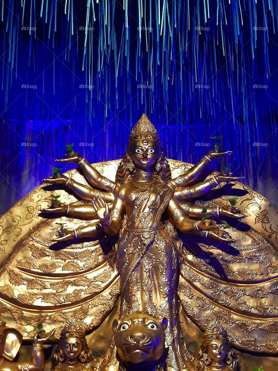 Captured a beautiful and exotic image of Goddess Durga idol, with an eye catching Light effects on it.