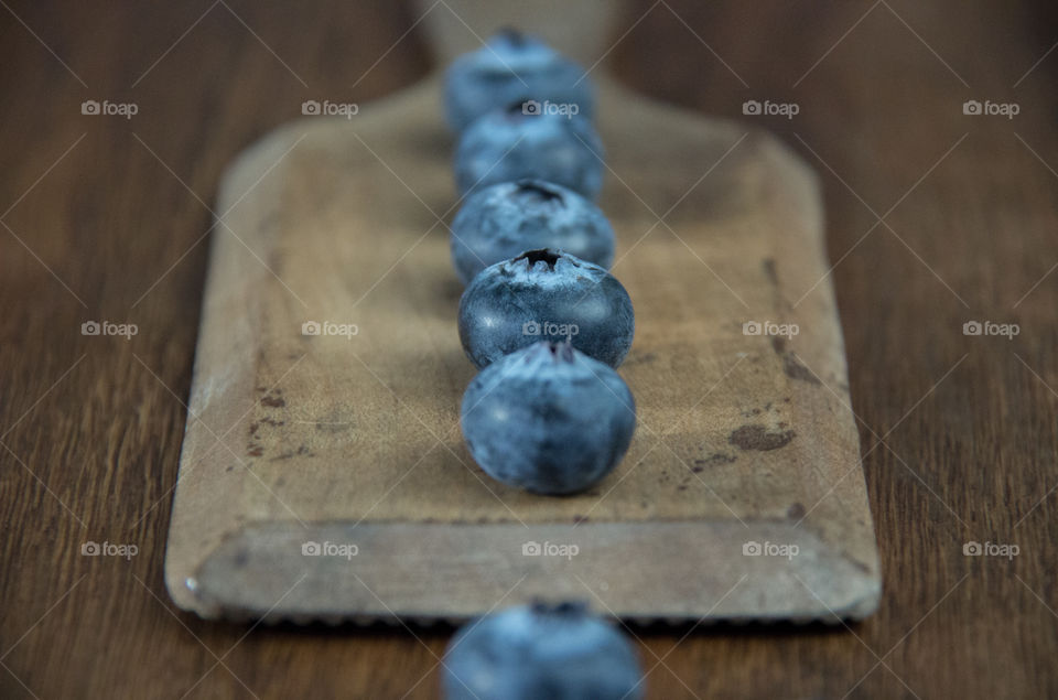 High angle view of blueberries on table