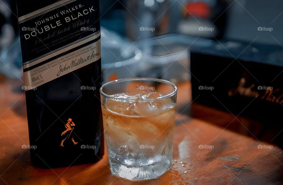 black laber Johnny walker whisky on the glass of ice