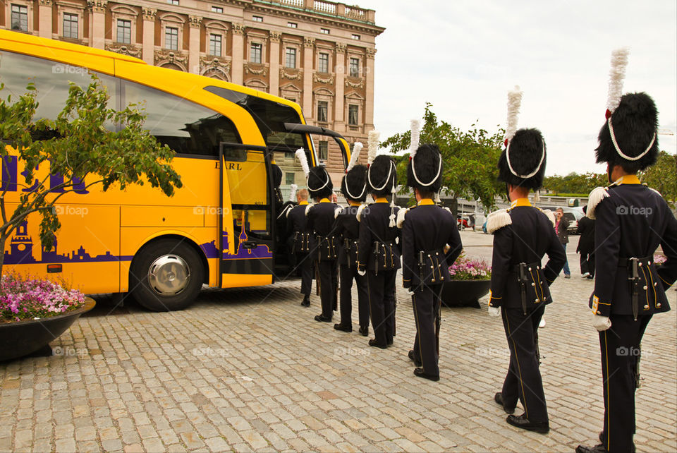 Royal soldiers leaving on a bus.