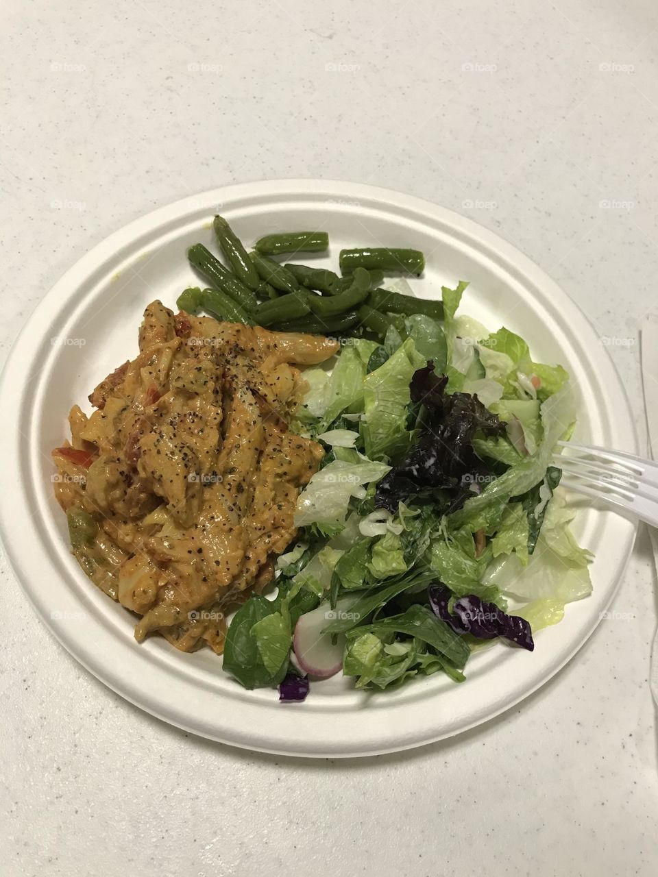 Pasta, salad and green beans for supper at church. This meal appears to be delicious enough to satisfy one’s tummy.