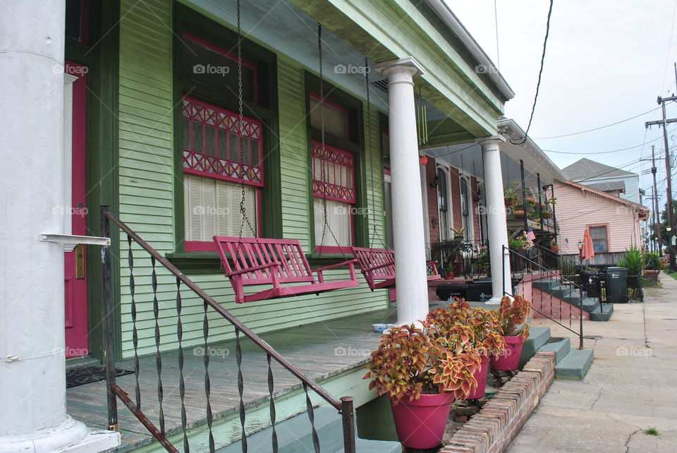 A front porch of a house in New Orleans, La