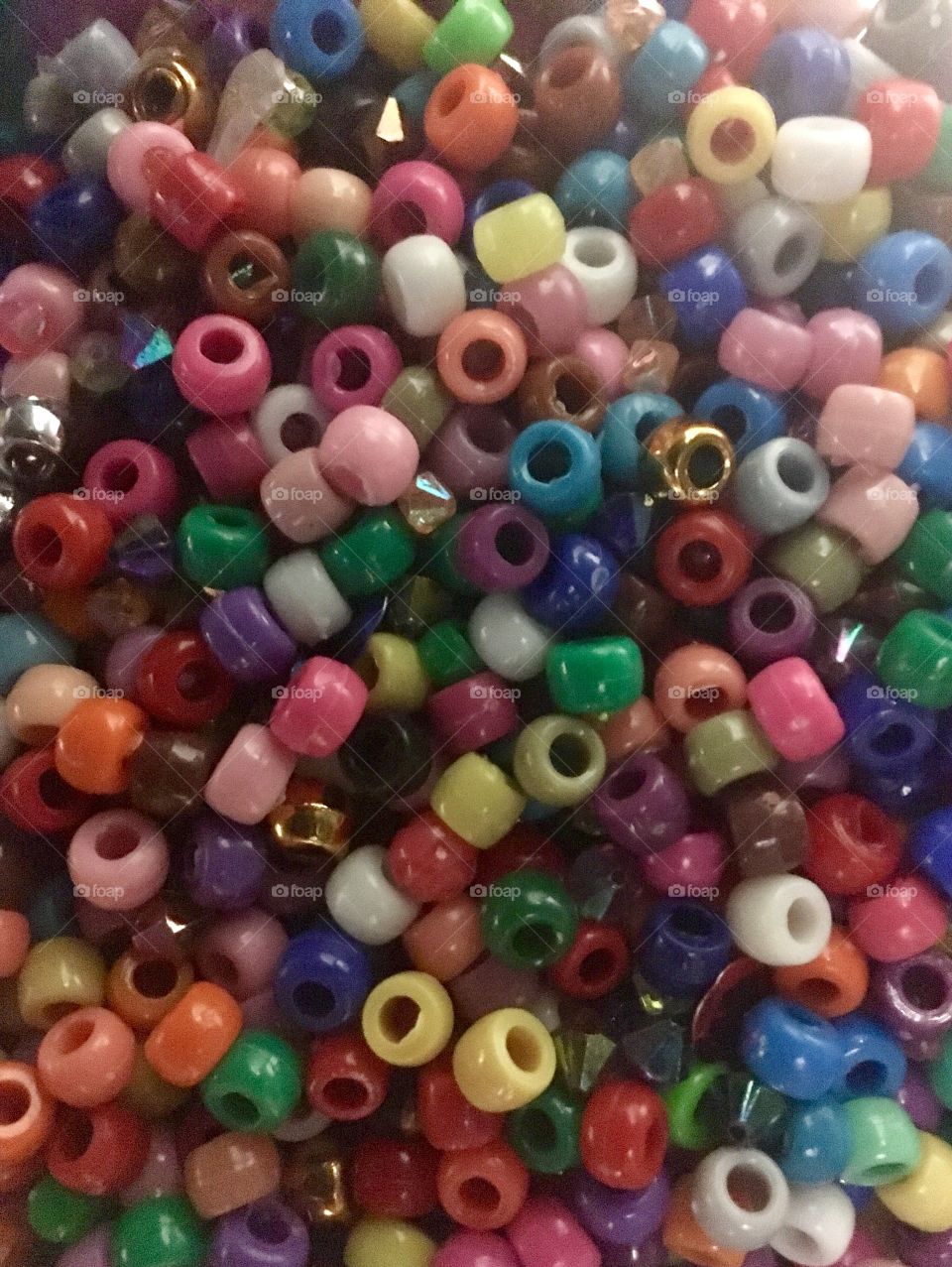 A pile of plastic craft beads.   