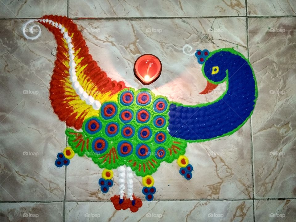 Deepawali / Rangoli / Indian Festival of lights , Joy and Happiness / Culture and Tradition / Handmade Beautiful Rangoli of Peacock