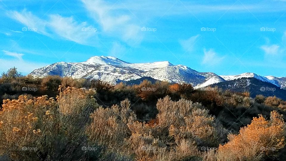 snow covered mountains in the high desert in he late fall