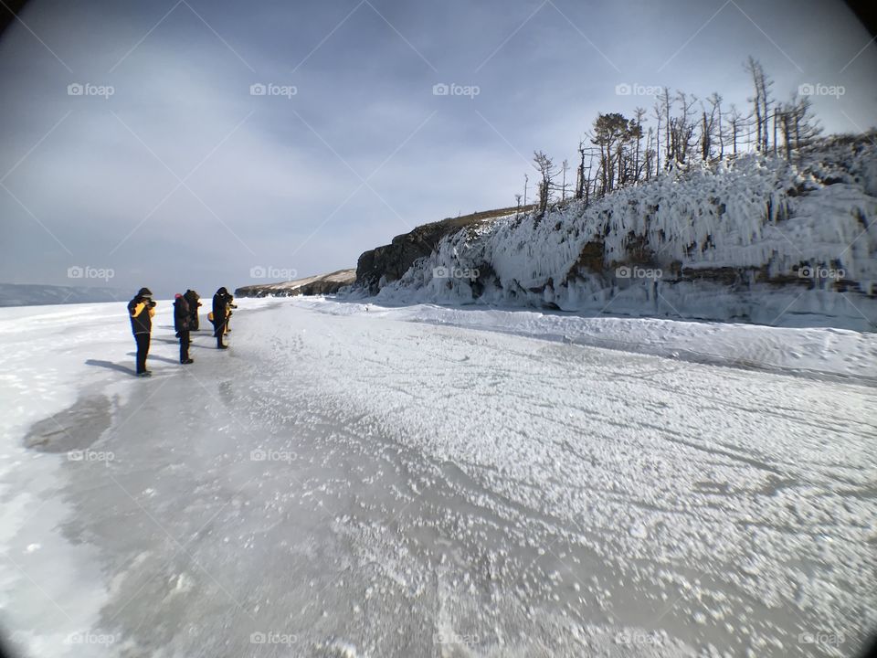 Phoyography moment at ice valley on the way to ice cave in Baikal lake Russia