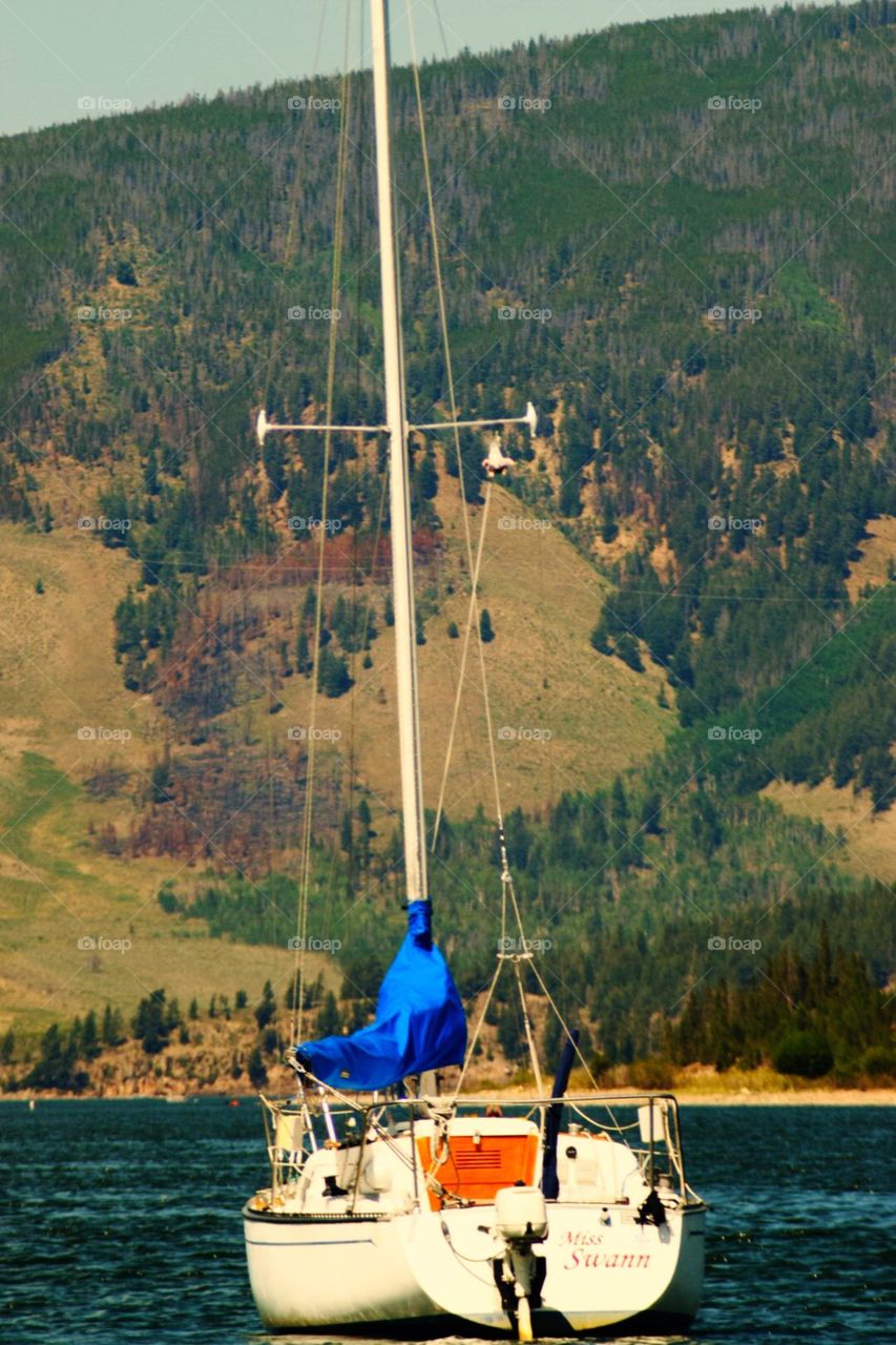 Sailboat on a lake in the mountains