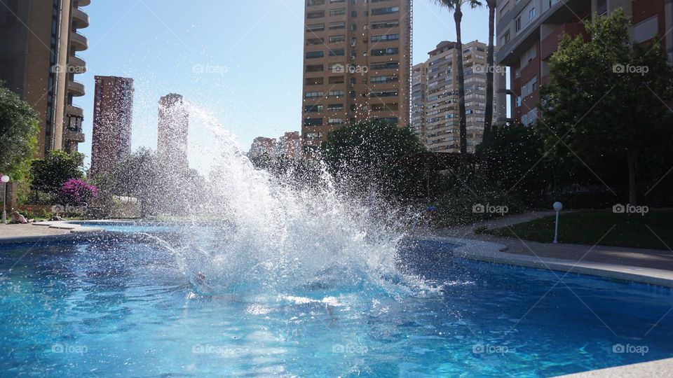 Summer#swimmingpool#splash#buildings