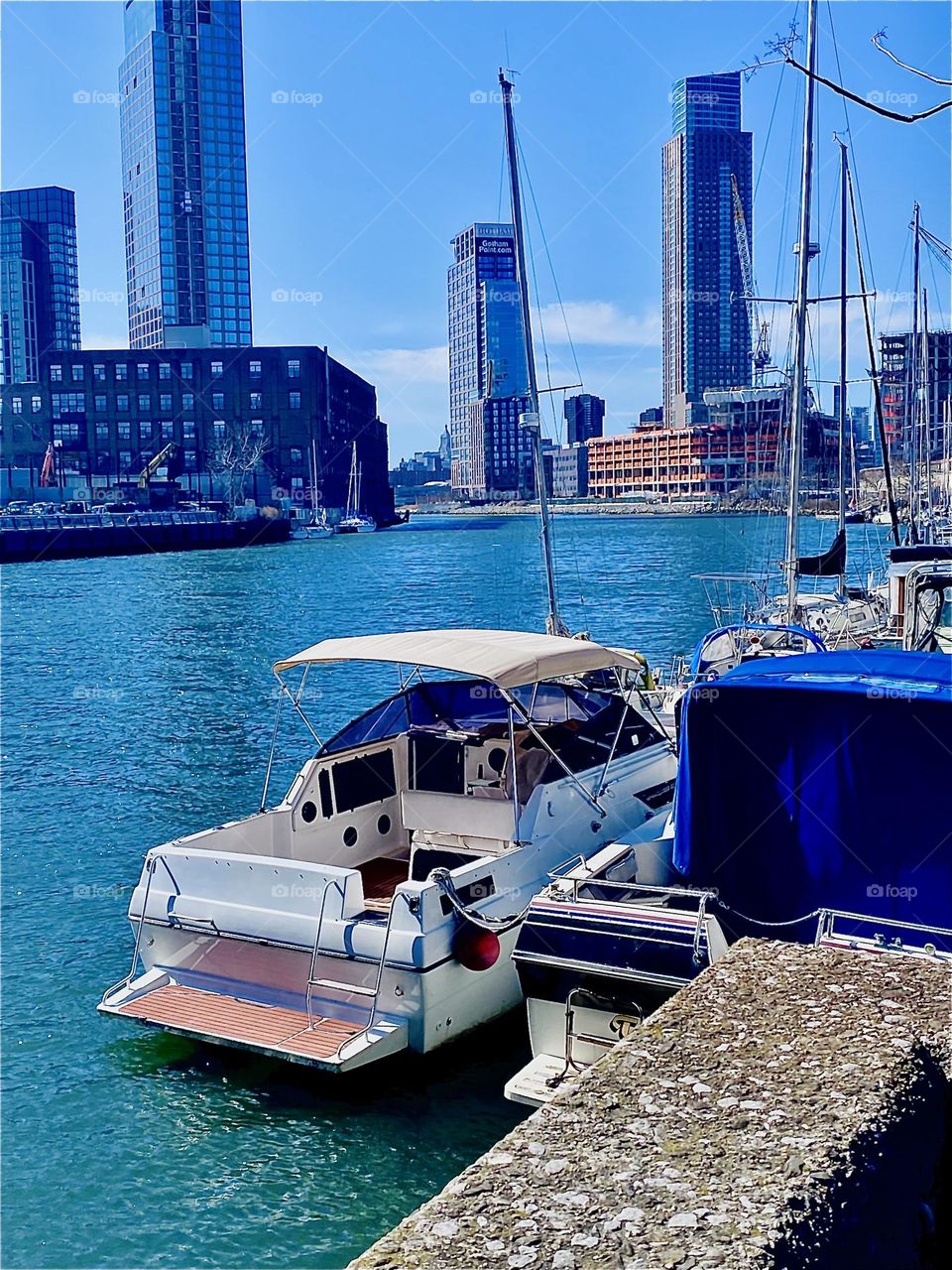 Here at “Newtown Creek” by the “Pulaski Bridge” we have a great variety of small boats from sailboats to motorboats in different styles. Some of them are big enough to be houseboats. 2023. Hypnotic Productions