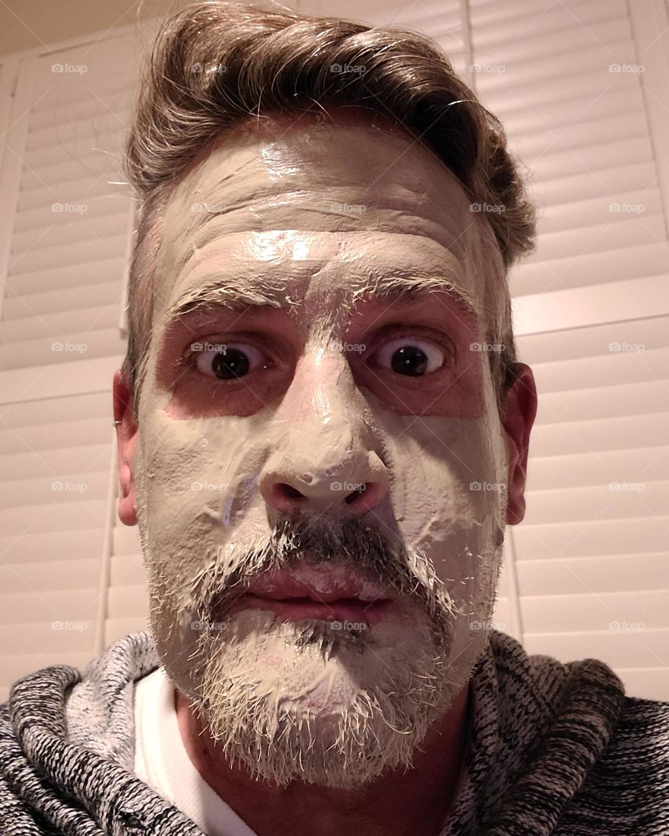 The monster behind the mask, self facial love with clay mask, looking spooky 