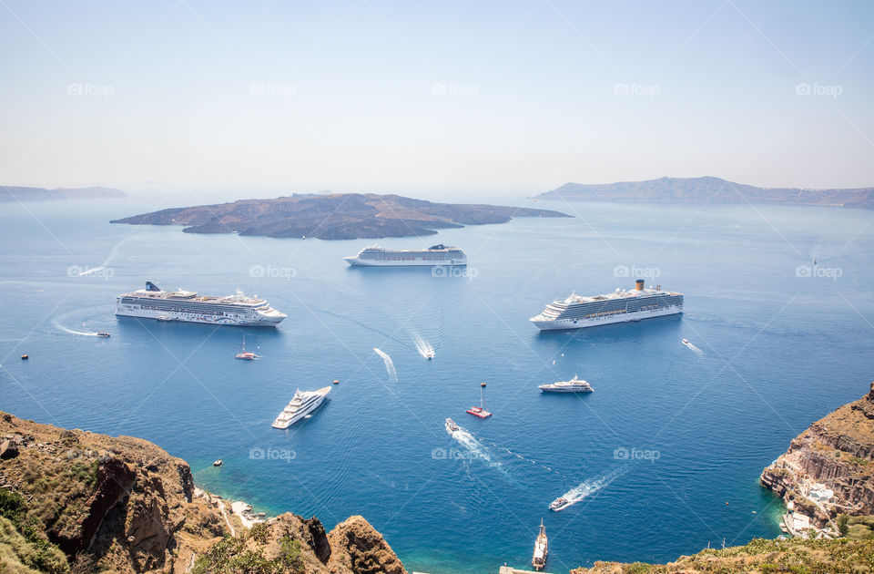 Top View Of The Caldera Cruise Ships And Boats In The Sea On Famous Greek Island Santorini