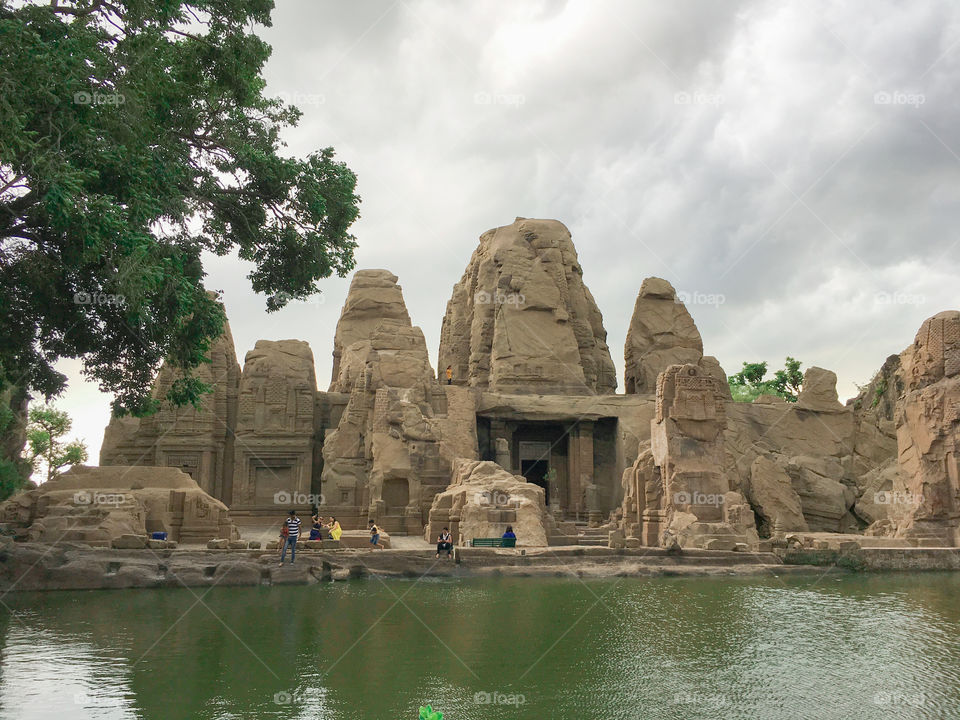 Indian rock-cut temple at masrur, Masroor temple in Kangra valley , Himachal Pradesh, an early 8th century complex rock cut temple, dhauladhar range of the Himalayas 