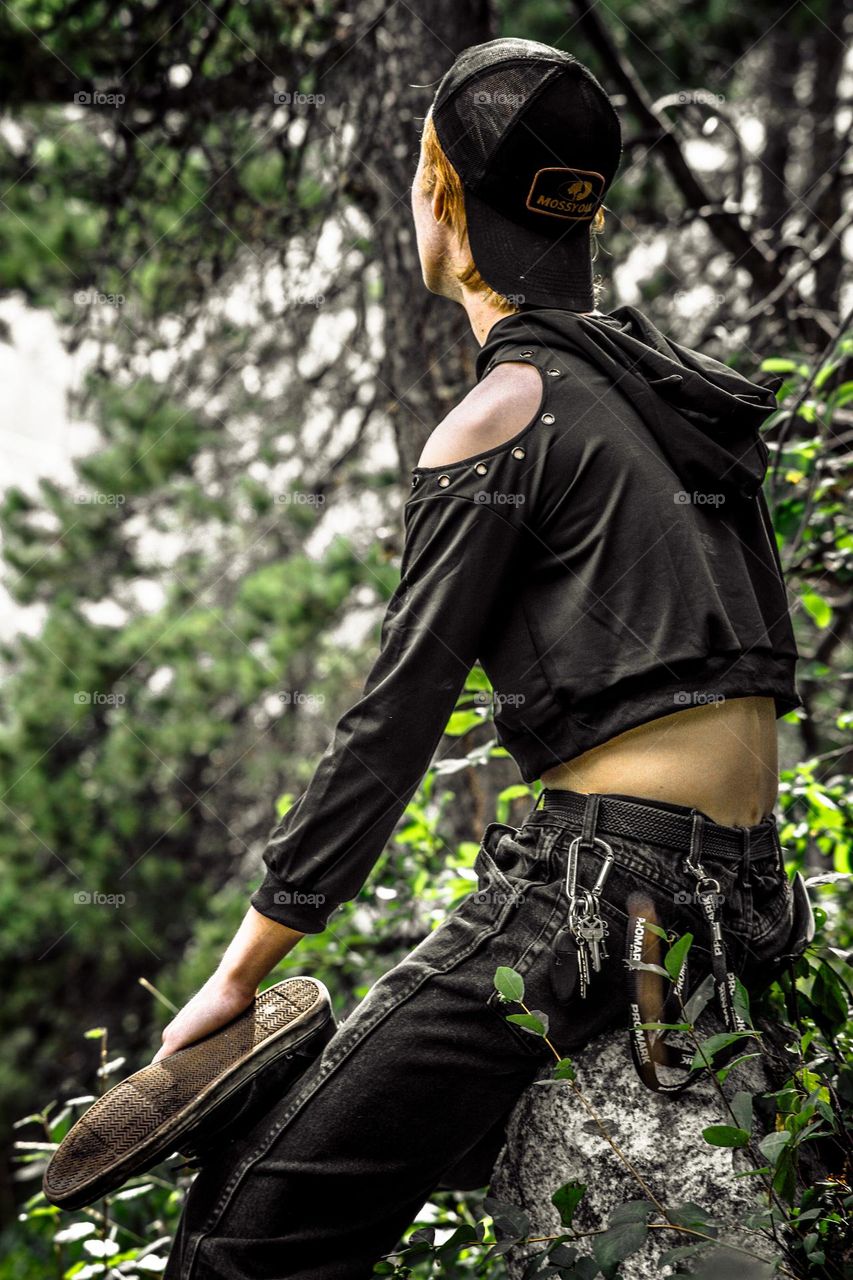 Green portrait next to the river.