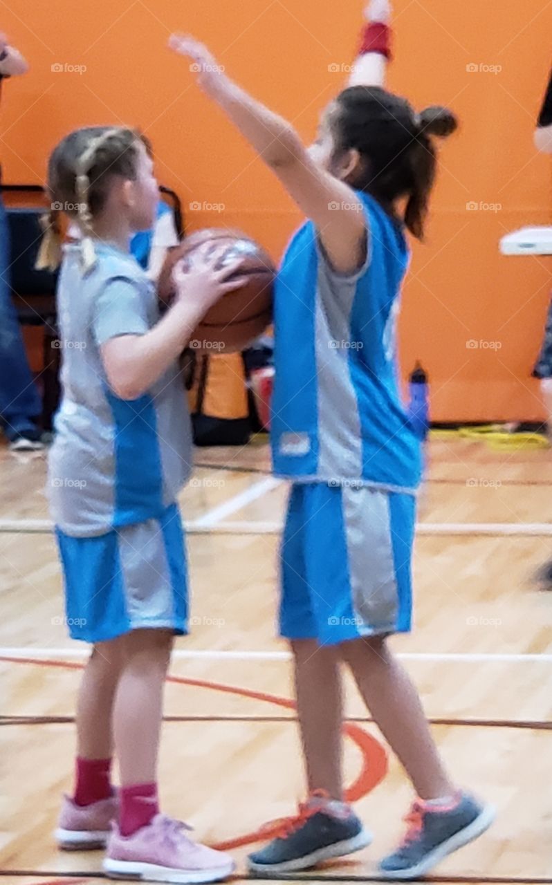 playing girls basketball