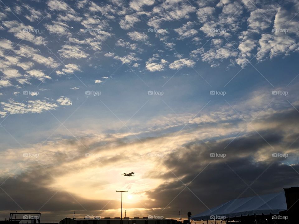 Sunrise with airplane