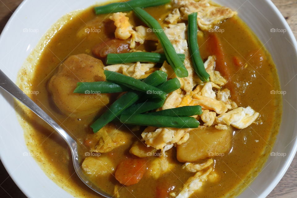 Homemade Chicken Curry. Ingredients: curry powder, chicken, green beans, egg, carrot, onion and potato.