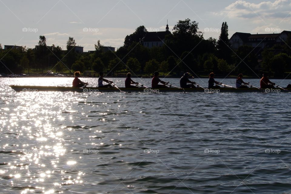 People Having Fun Rowing