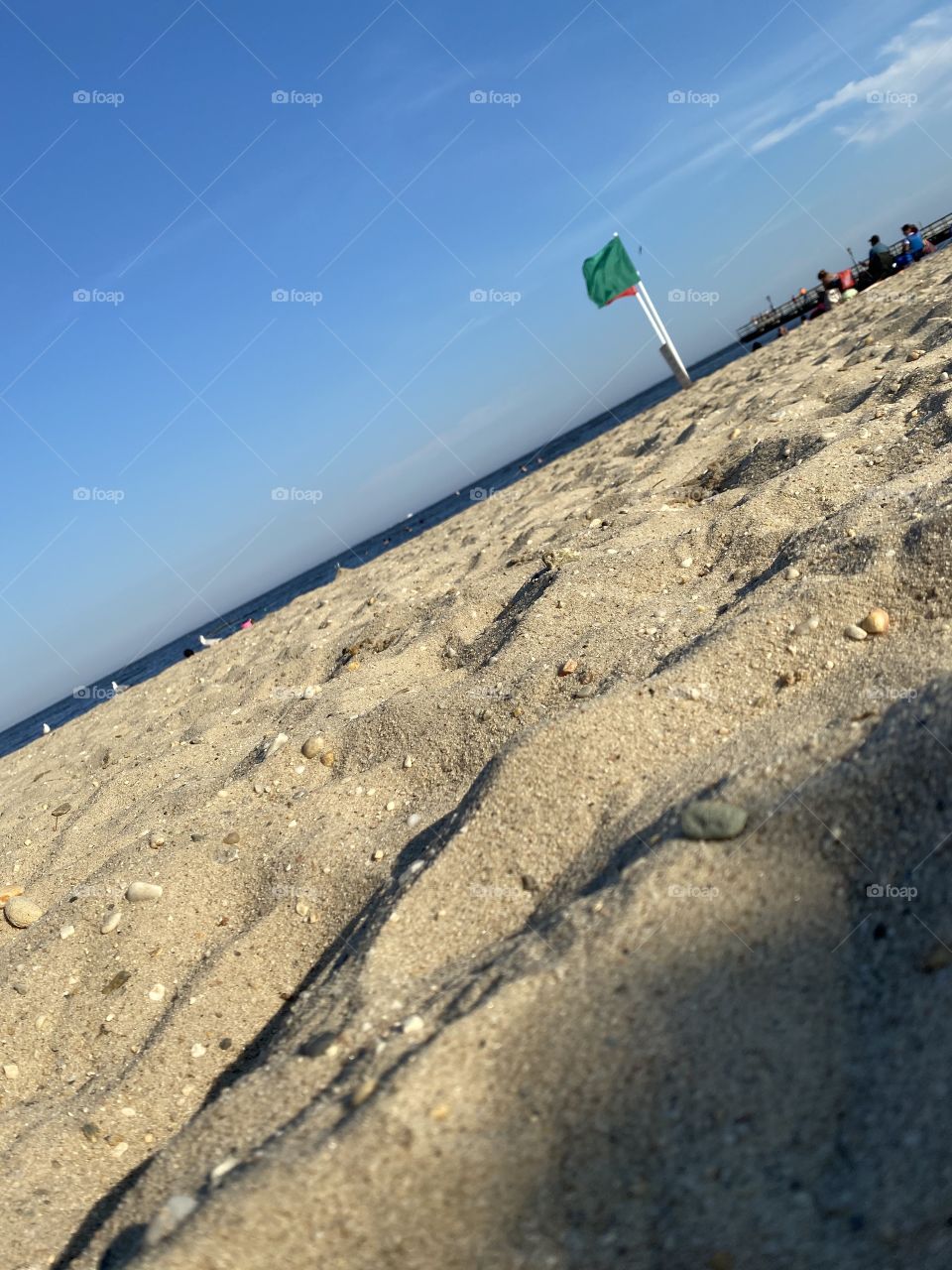 Beach with green flag