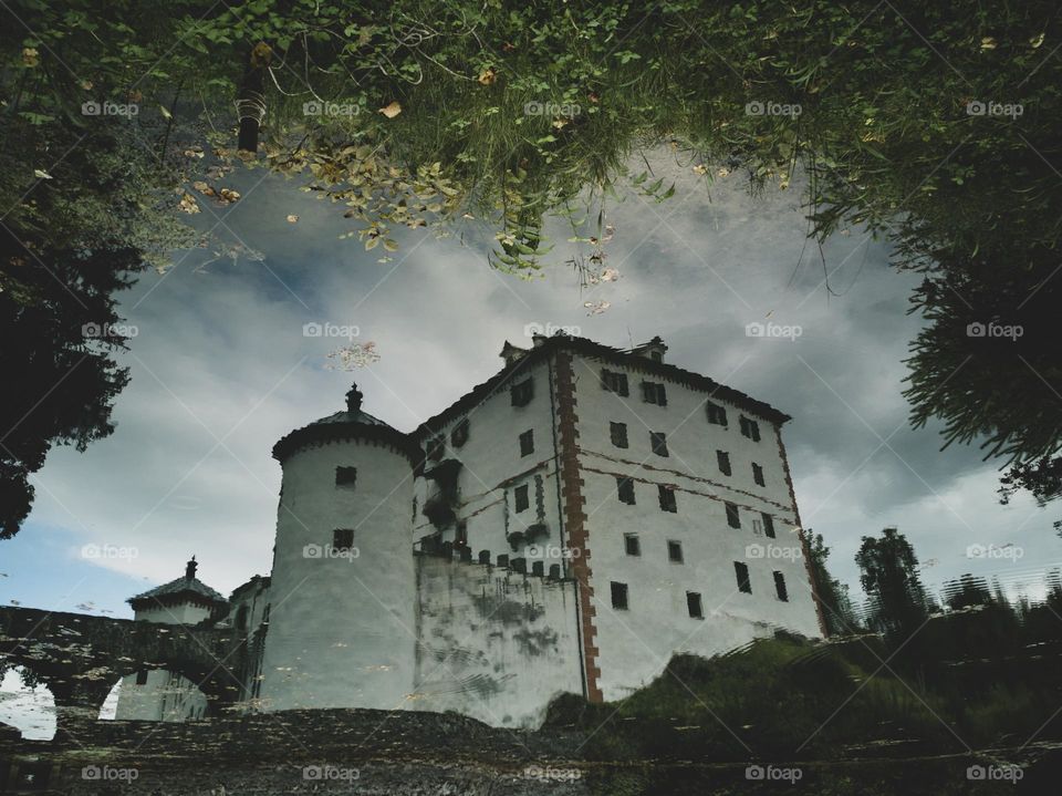 water reflection of castle