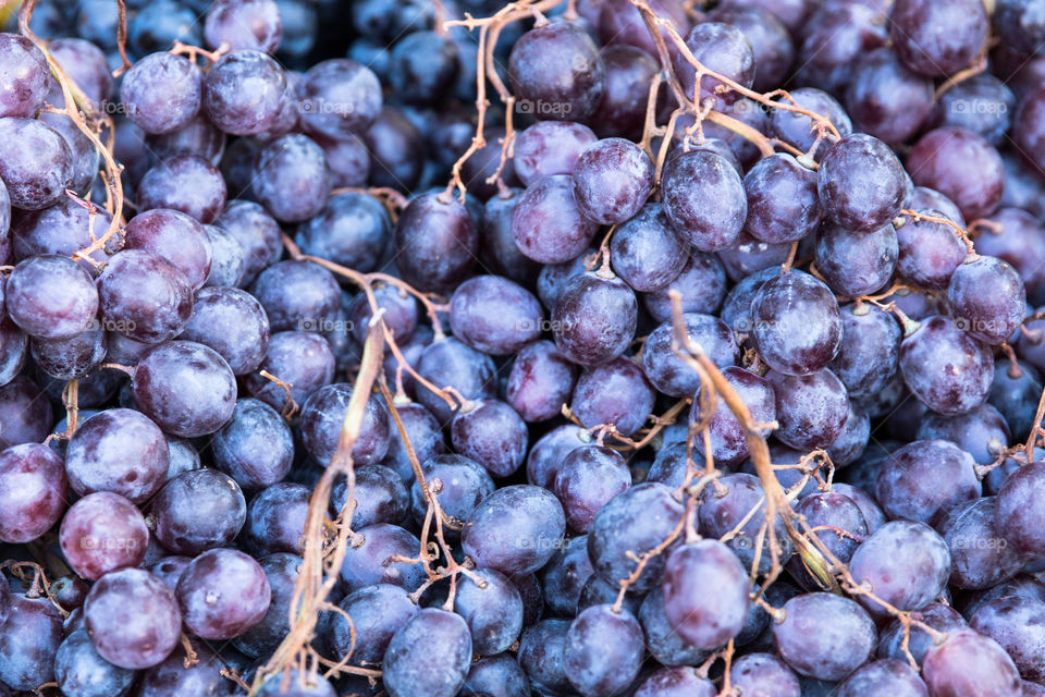 Fresh Red Blue Grapes In Grocery Supermarket