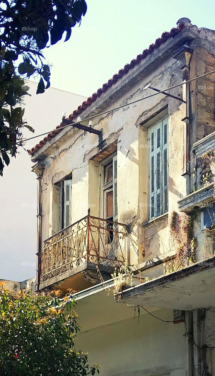 abandoned house with balcony