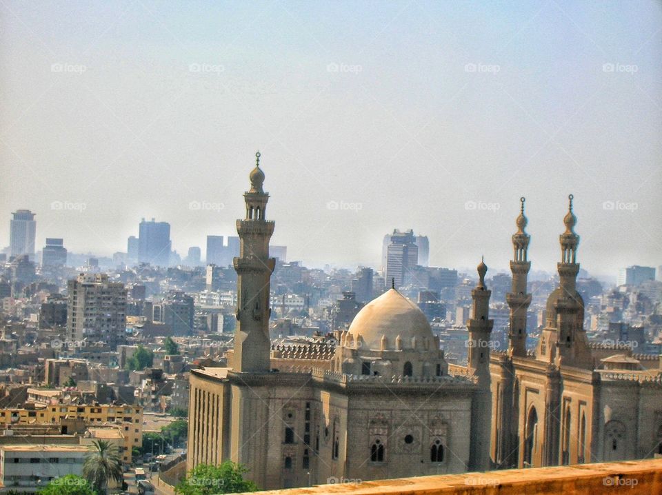 Mosque of Sultan Hassan with Cairo in the background. Egypt.