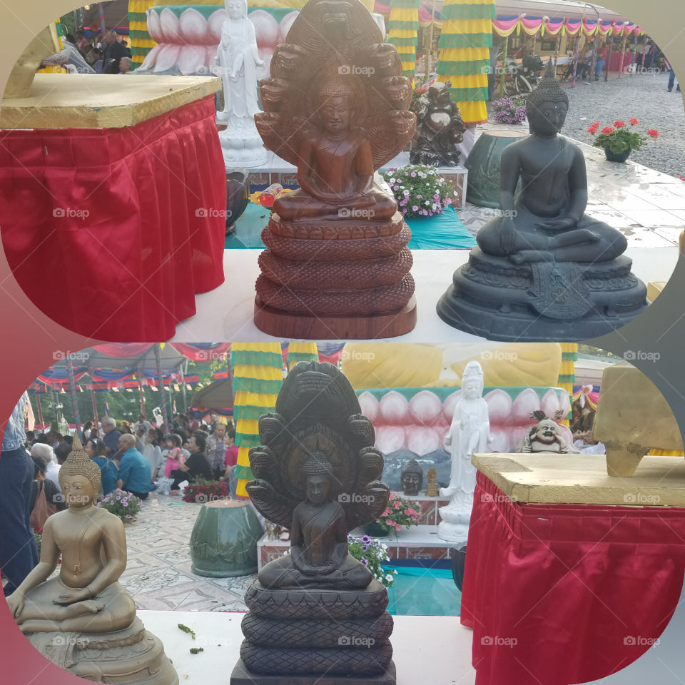 Miniature Naga and Buddha statues. amaturephotography.