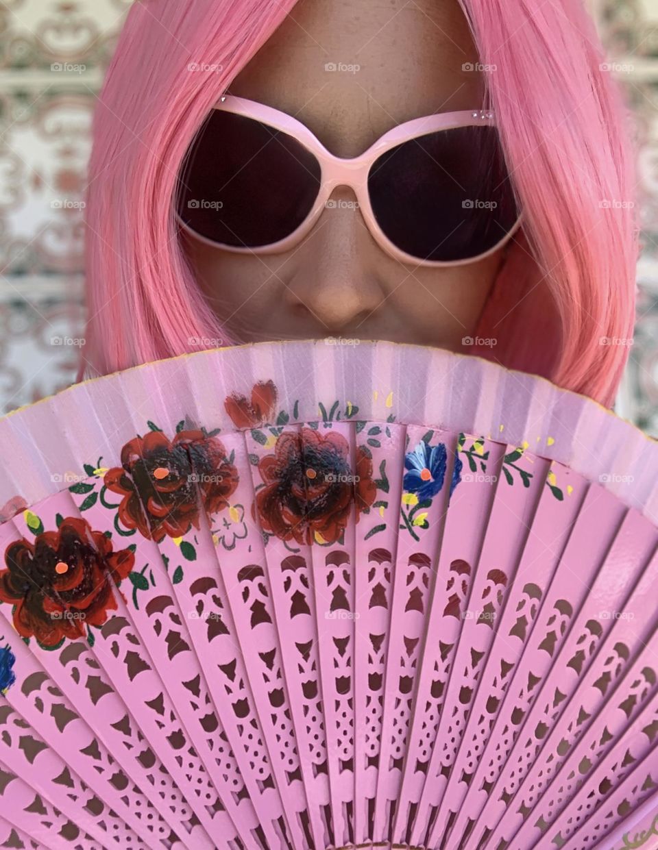 Barbie themed selfie with pink wig, sunglasses and hand fan