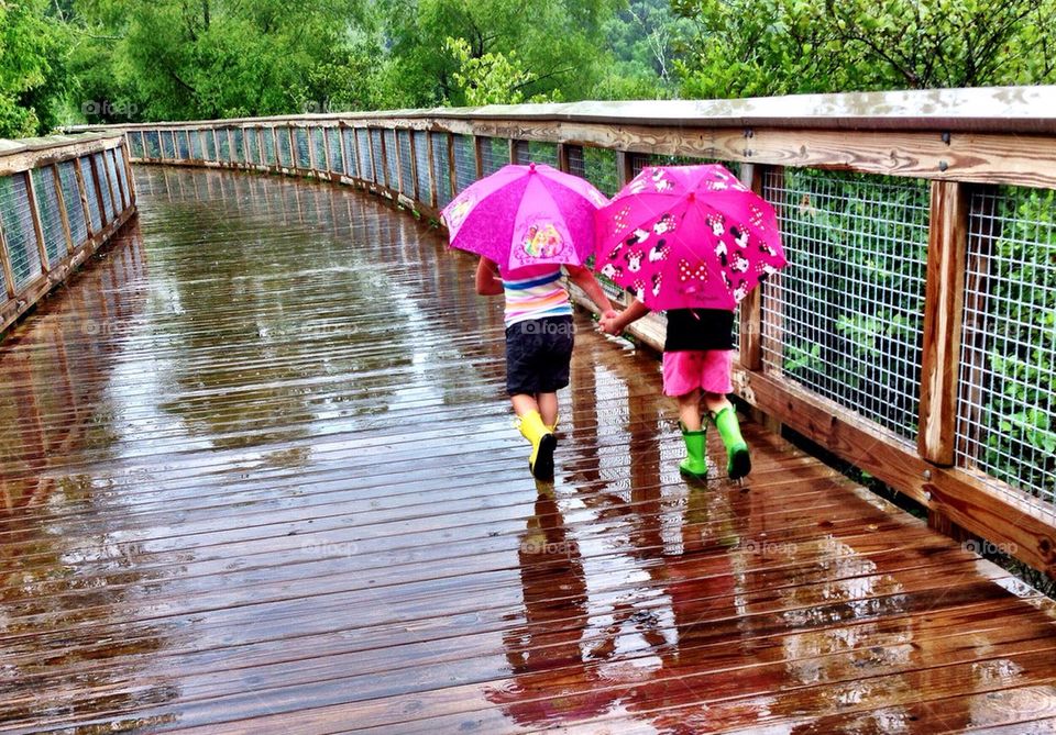 girl play fun park by cable