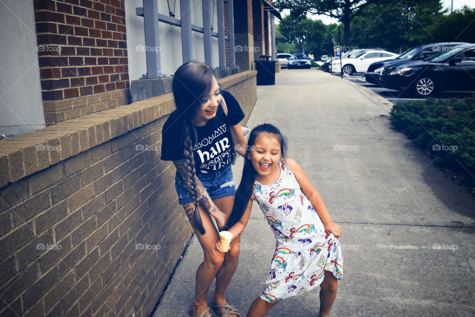 Mother and daughter having fun 