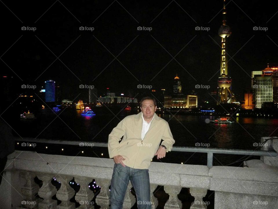 pudong view at night. model at cityscape of shangai at night