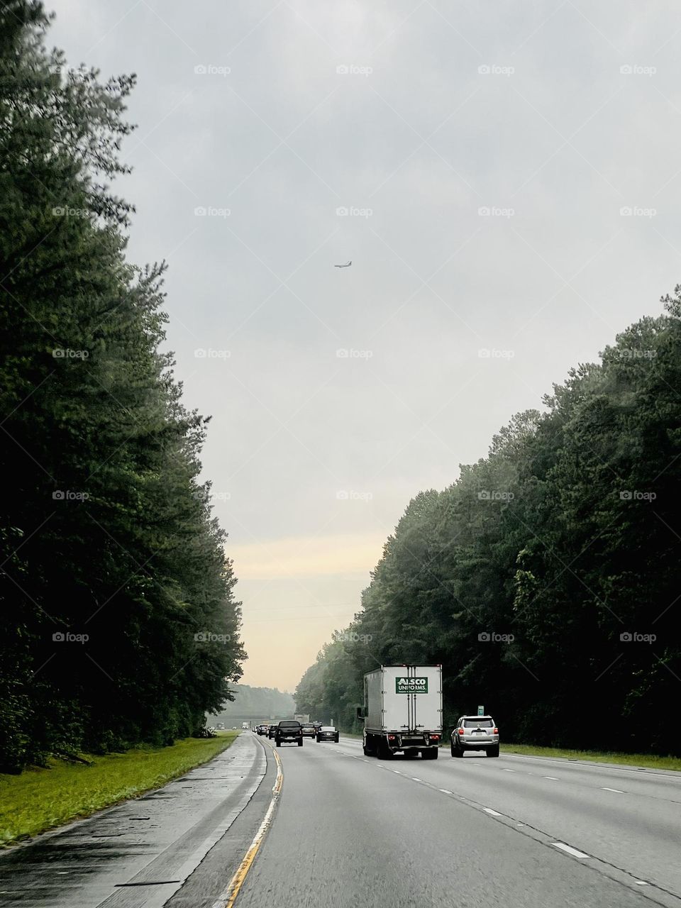 View from moving vehicle along a highway in the southeastern United States 