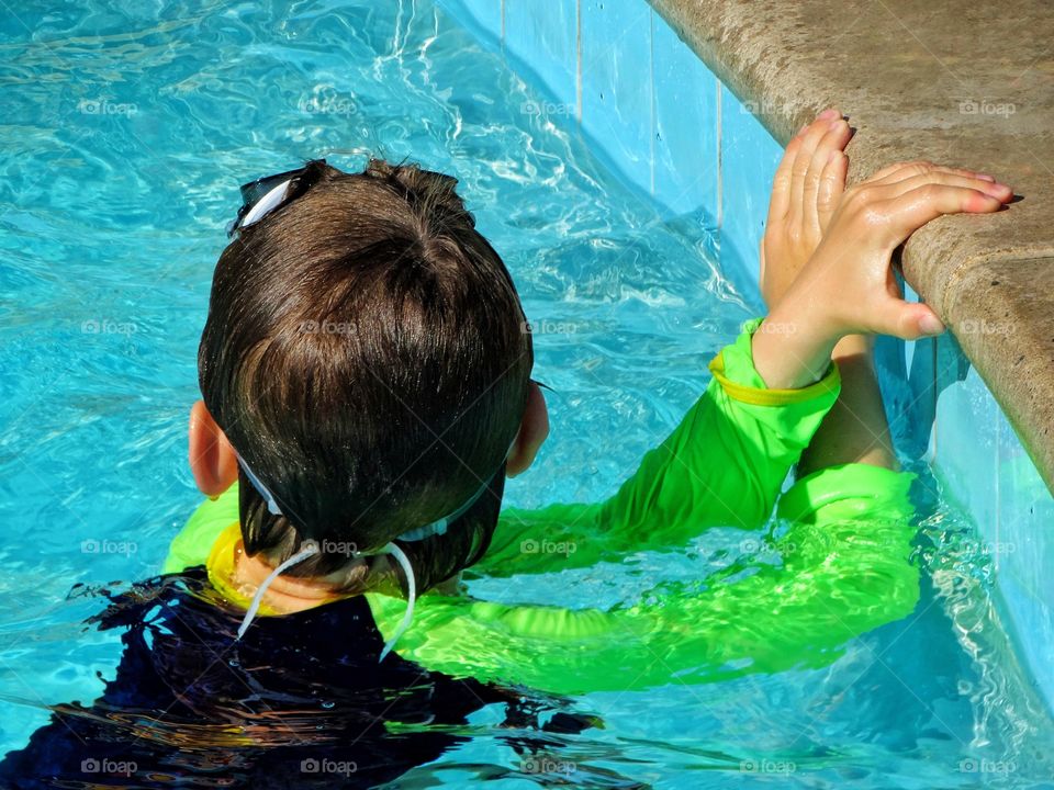 Boy In The Pool
